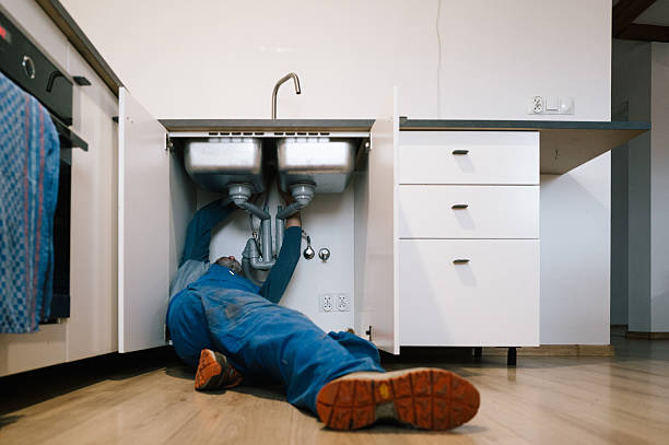 Professional Drain Cleaning technician working in Madison, WI